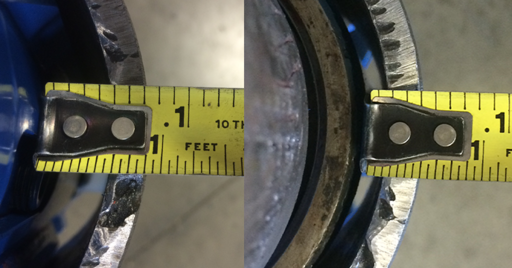 A tape measure highlights the difference in flow-by area between the Slimline TAC and a standard B2 anchor